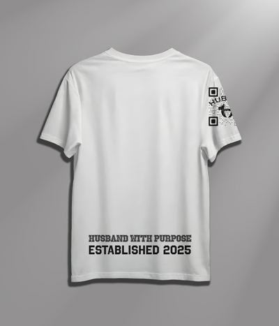 White t-shirt with text and graphics on a gray background